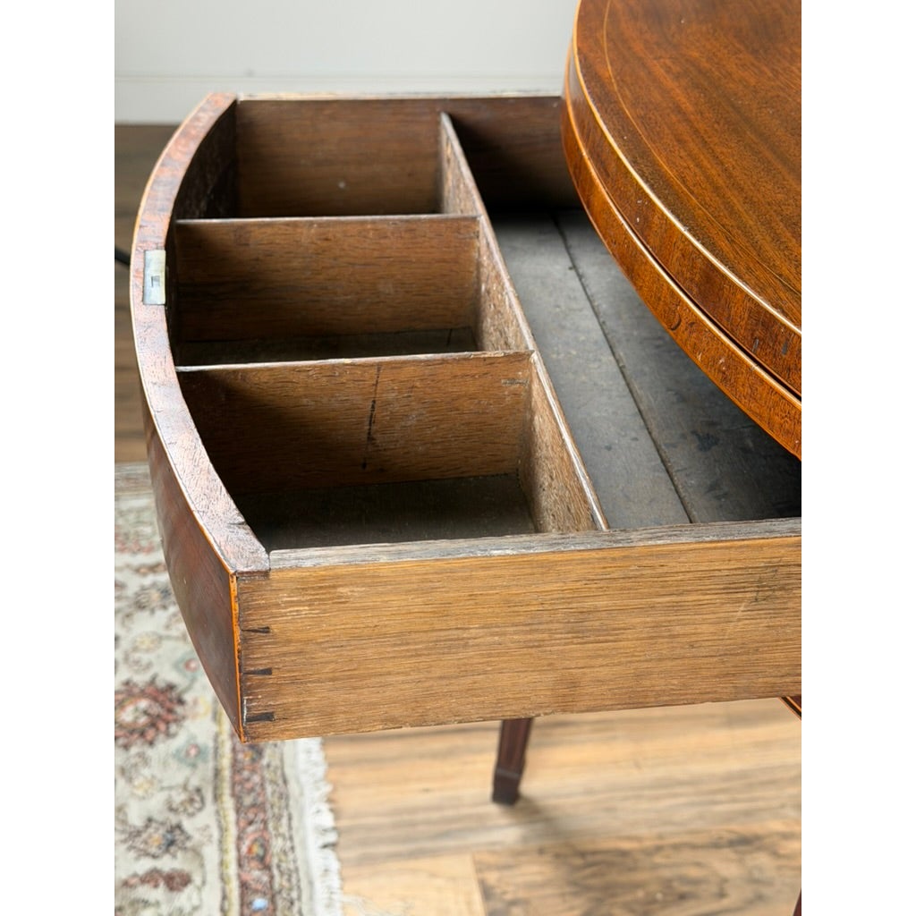 An English George III Mahogany and Satinwood-Inlaid Demilune Games Table, circa 1790–1810, shown with an open drawer revealing three storage compartments.
