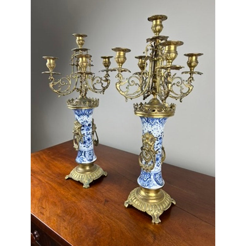 Boch Dutch Delft porcelain and gilt bronze candelabra with lion masks