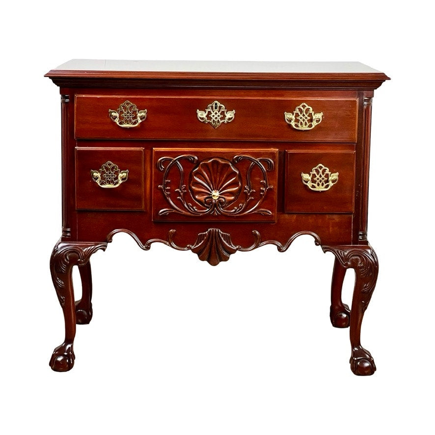 Vintage Solid Mahogany Chippendale Style Lowboy by Councill Craftsmen, featuring ornate brass handles, carved details, clawfoot legs, three drawers, and a polished dark wood finish.