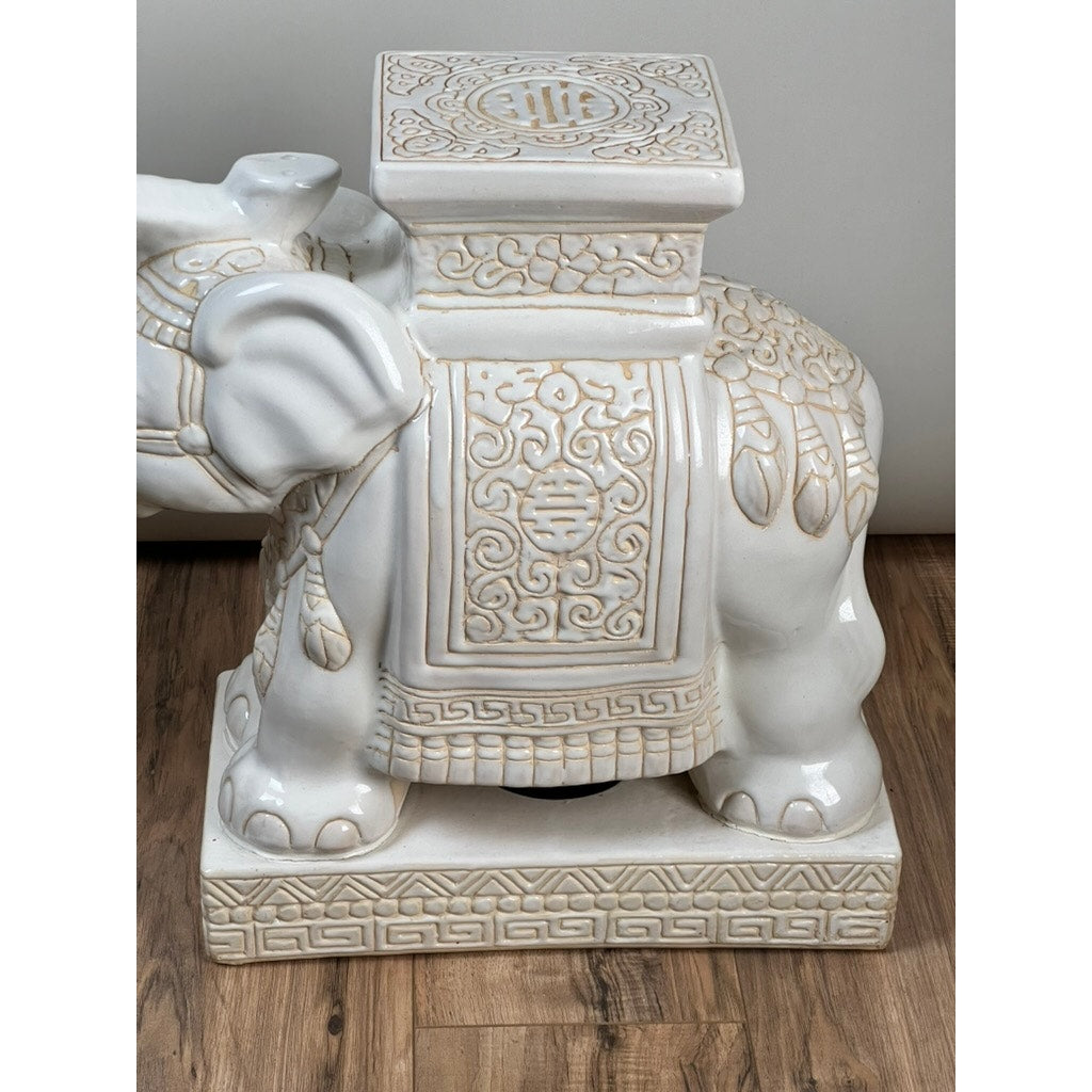 The Vintage Pair White on White Glazed Hollywood Regency Style Elephant Garden Seats feature intricate patterns and a flat square surface, perfect as chic decorative accents for your home. Brand: None/Unknown.