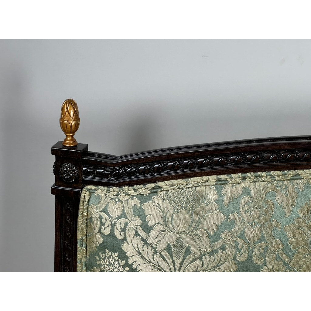 Ornate Vintage Louis XVI Style Settee featuring a carved dark wood frame, gold finials, and light green and gold damask upholstery inspired by French neoclassical design. Brand: Unknown.