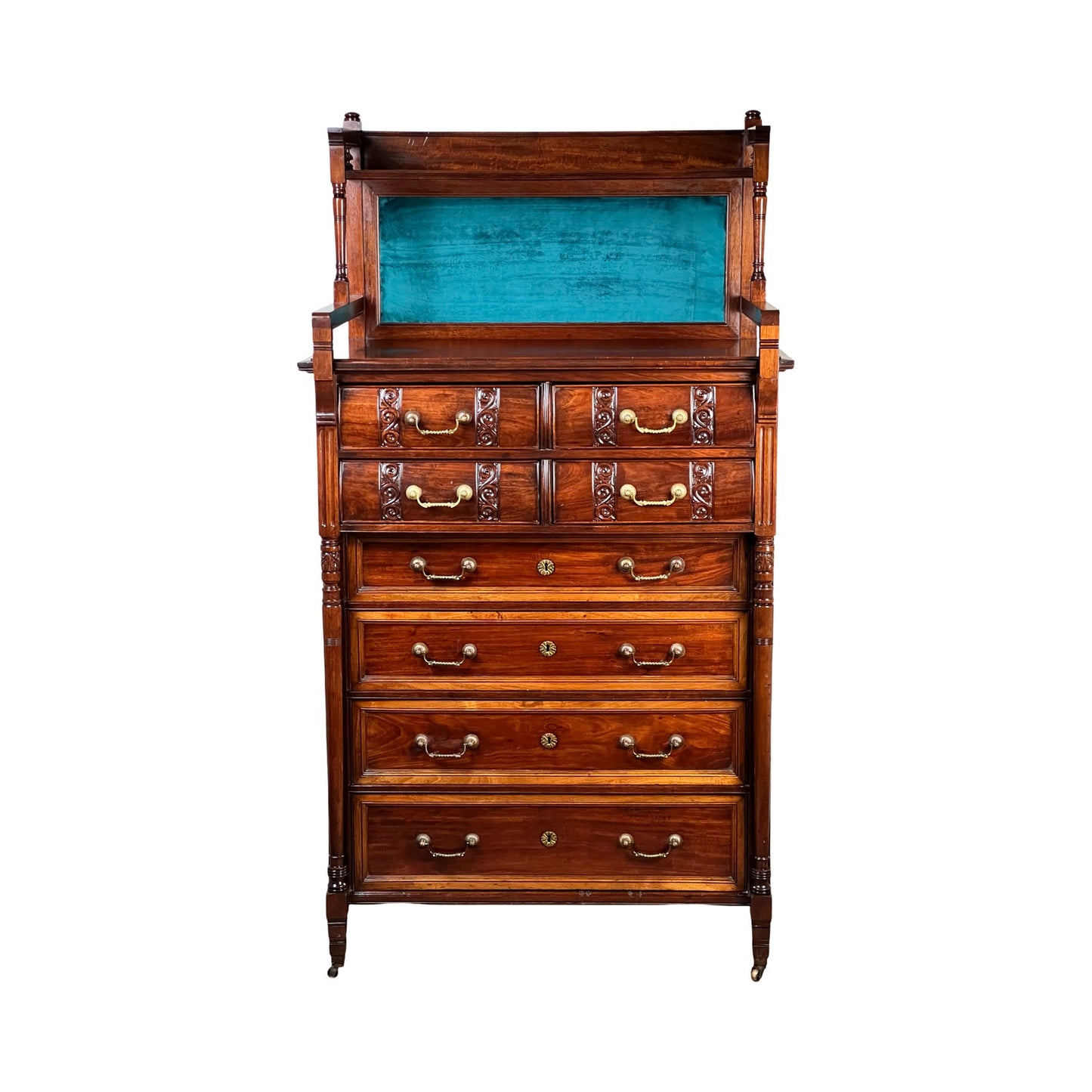 Antique Victorian Aesthetic Movement Mahogany Four Over Four Gentlemen’s Chest c. 1880 with ornate carving, brass handles, four large and four small drawers, plus a top open shelf lined in bright turquoise fabric. Brand unknown.