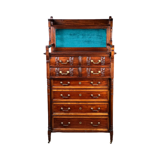 Antique Victorian Aesthetic Movement Mahogany Four Over Four Gentlemen’s Chest c. 1880 with ornate carving, brass handles, four large and four small drawers, plus a top open shelf lined in bright turquoise fabric. Brand unknown.