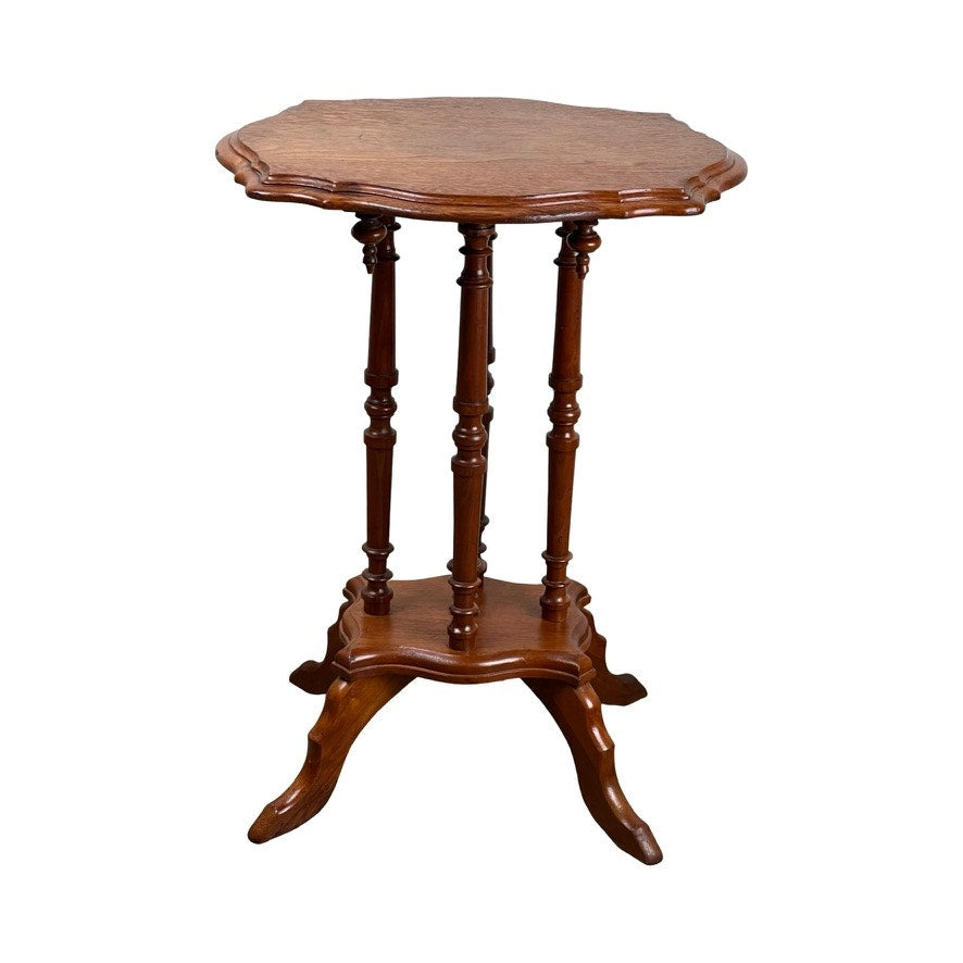 The Antique Victorian Walnut Turtle Top Candle Stand (late 19th c.) features a scalloped top, four carved legs, and a lower shelf in a polished brown finish—ideal as an antique accent or display table. Brand unknown.