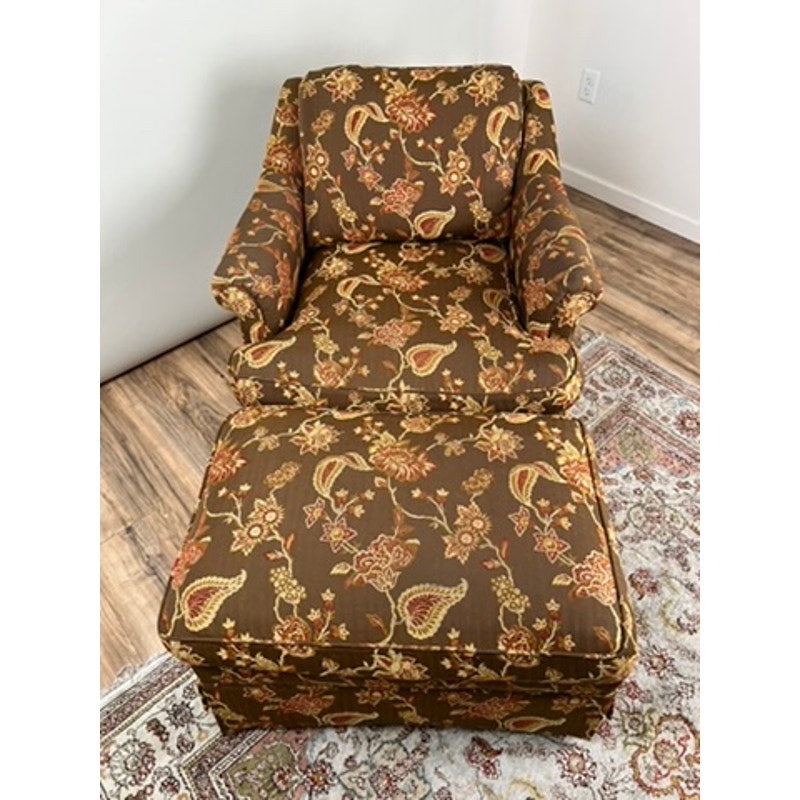 Custom upholstered vintage club chair and ottoman with skirted base