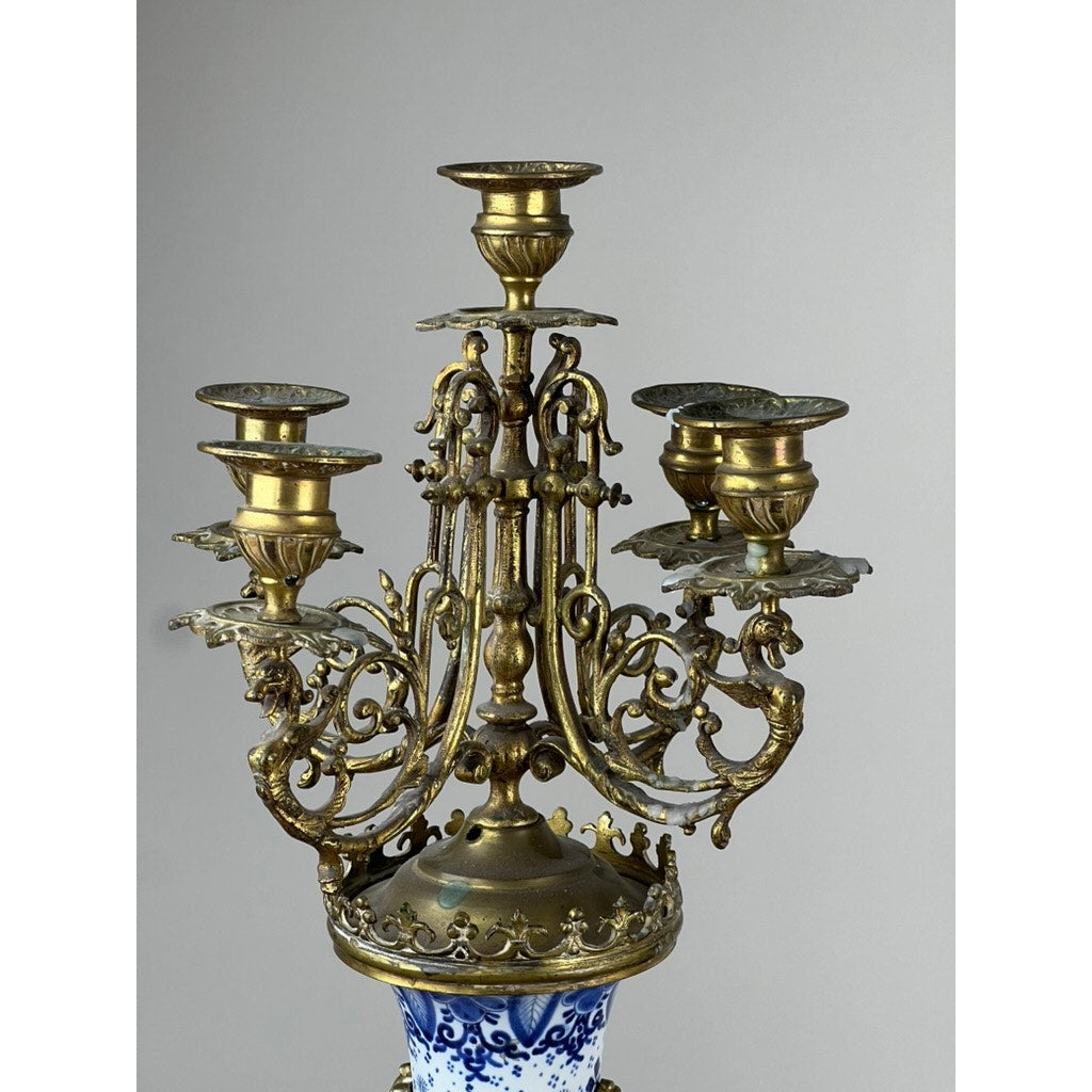 Five light gilt bronze scrolling arms on Dutch Delft porcelain candelabra