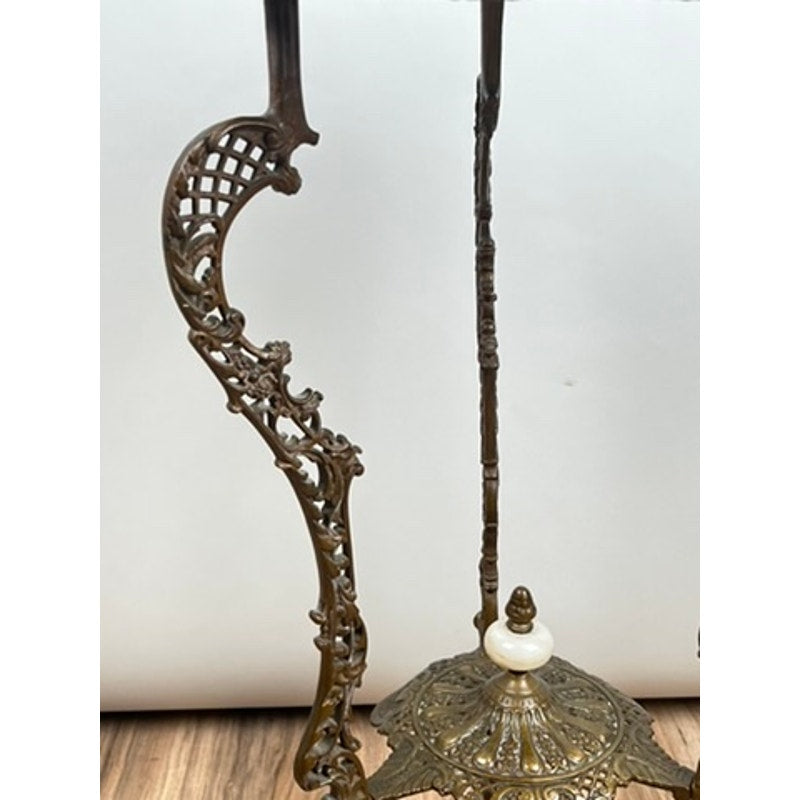 Antique Victorian Bronze and Onyx Stand (c. Late 19th Century) featuring ornate filigree on the curved arm and a decorative base, evokes vintage craftsmanship; displayed against a plain background on a wooden floor. Brand: Unknown.