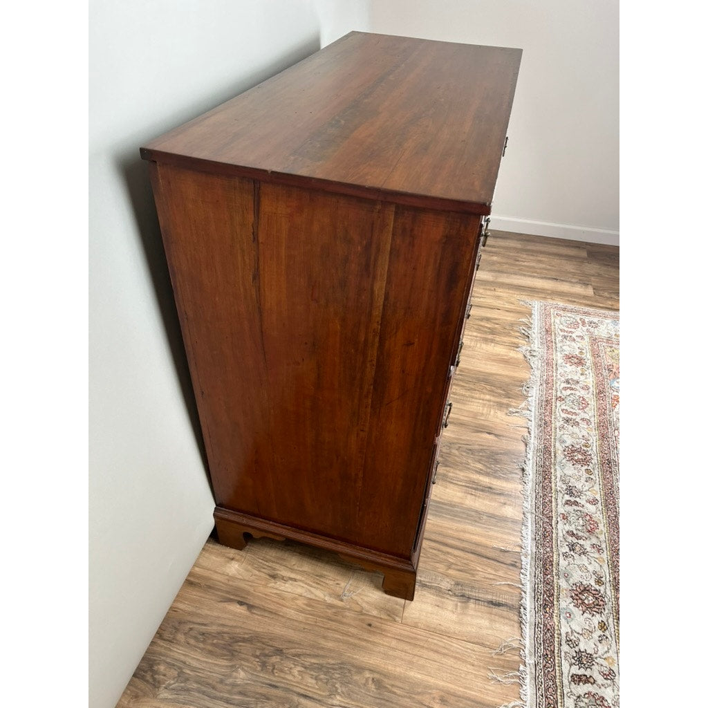 An Antique George IV Butlers Secretary, c. Early 19th Century, stands against a white wall on a wood floor beside a patterned area rug with fringed edges. Brand: None and/or Unknown.