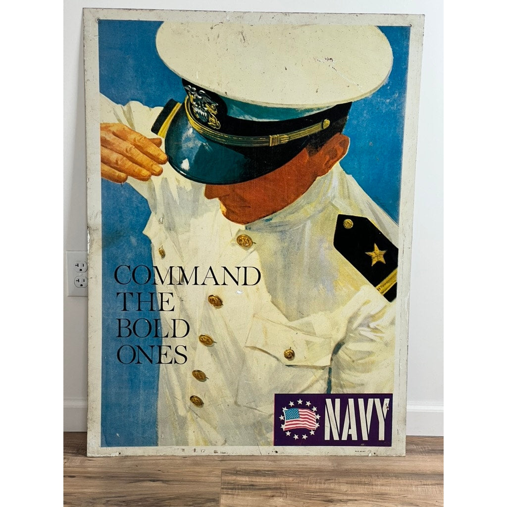 An original Vietnam Era double-sided U.S. Navy recruiting tin sign by Lou Nolan features the USS Saratoga with vintage artwork of a Navy officer saluting and "COMMAND THE BOLD ONES" slogan, plus a stylized U.S. flag and NAVY logo.