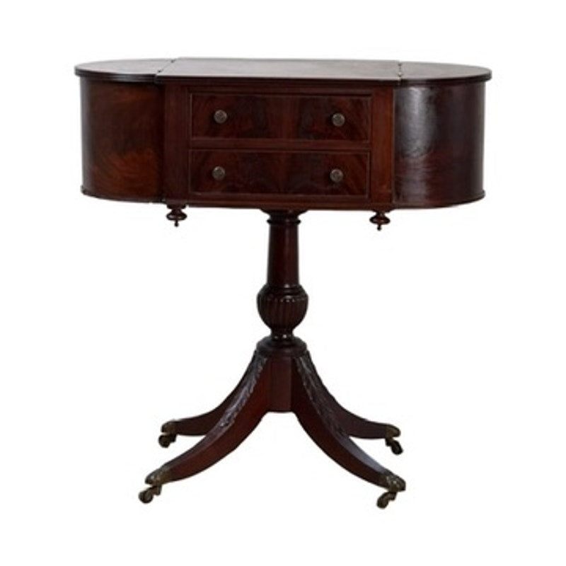 Early 19th Century New York Classical Mahogany Astragal-End Work Table in the manner of Duncan Phyfe, c. 1815–1825, featuring two central drawers, rounded astragal-shaped ends, and four gracefully curved legs set on small casters—an elegant reflection of refined early 19th-century parlor craftsmanship.