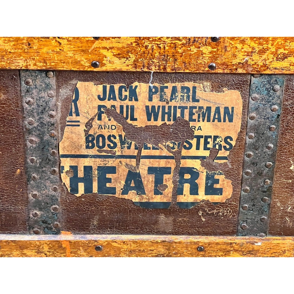 A close-up of a worn, vintage poster on the C.A. Taylor Touring Trunk of John B. Cordaro, Paul Whiteman Orchestra reed player (c. 1930s), with faded text evoking the golden age of big band music and names like JACK PEARL and BOSWELL SISTERS.