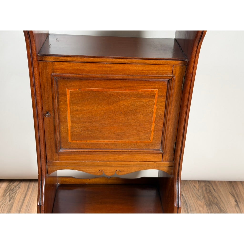 An Antique English Mahogany Inlaid Shaving Stand with Adjustable Mirror, c. 1880–1900, featuring a central cabinet door and an open shelf at the bottom.