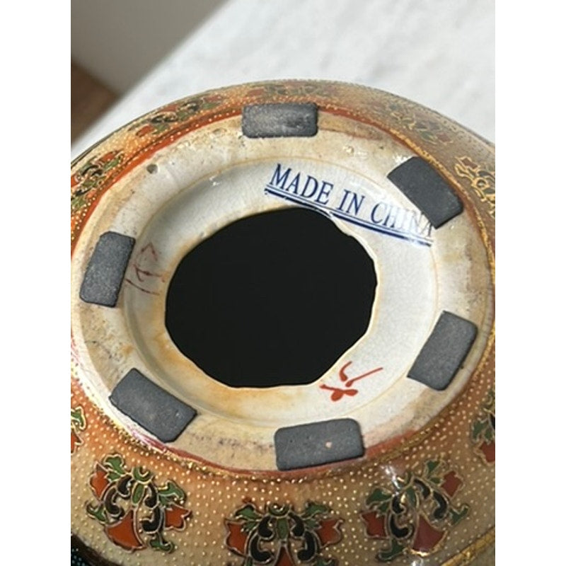 The underside of this Large Antique Satsuma Porcelain Egg Chinese Export features a Made in China stamp, black rectangular pads, and ornate red, gold, and green base patterns. The inner rim has some crazing and discoloration. Brand unknown.