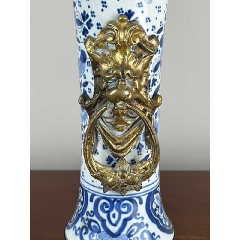 Boch Dutch Delft porcelain and gilt bronze candelabra with lion masks