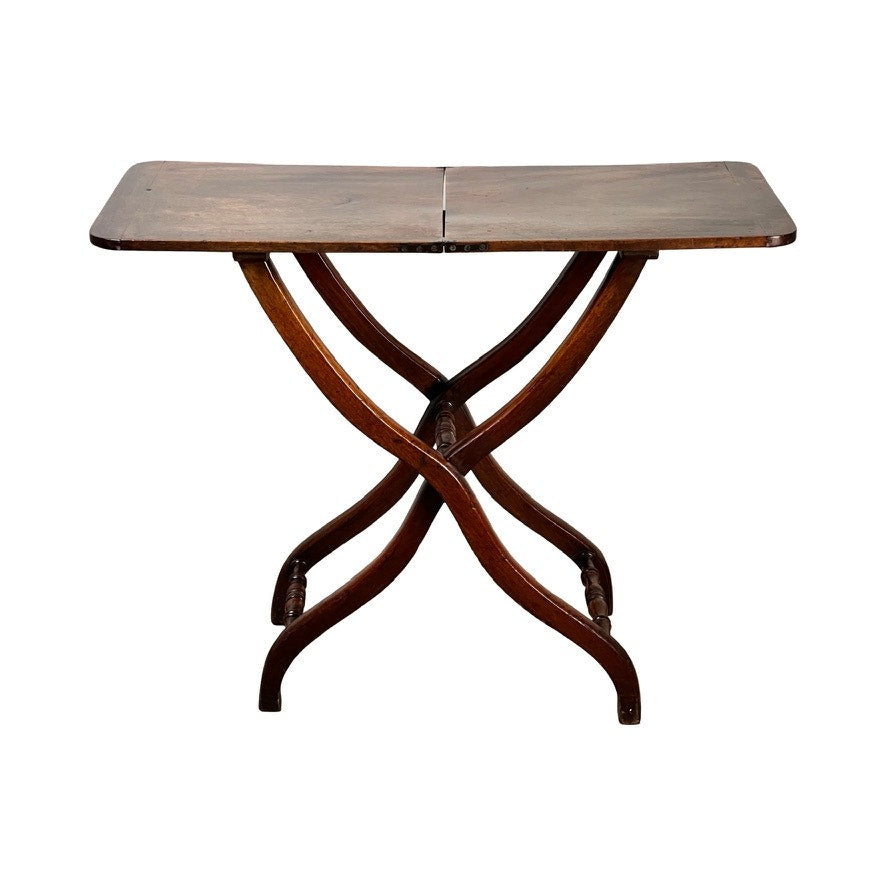 Antique English Regency Mahogany Folding Coaching or Sporting Table (c. 1825–1845) with a rectangular top and crossed, curved legs, shown against a white background. Brand unknown.