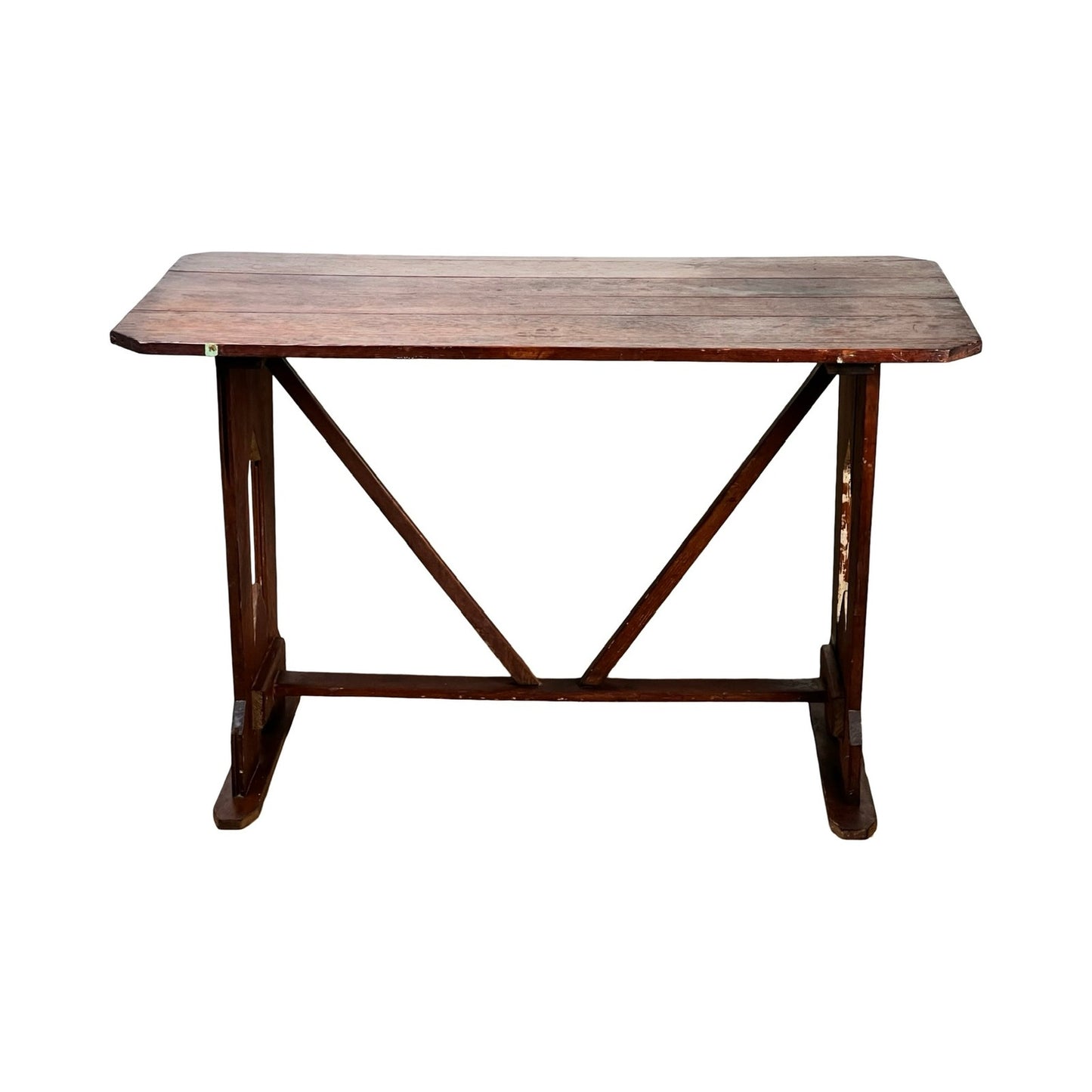 The Antique Rustic Italian Fratino Trestle Table (late 19th century) features a solid wood rectangular top with rounded corners, sturdy legs joined by diagonal and horizontal beams, and a worn finish for classic farmhouse charm.