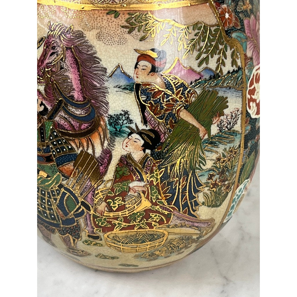 This Large Antique Satsuma Porcelain Egg features intricate artwork of two figures in elaborate attire with wheat, alongside a decorative horse and a mountain landscape, reflecting classic Chinese export style. Brand unknown.