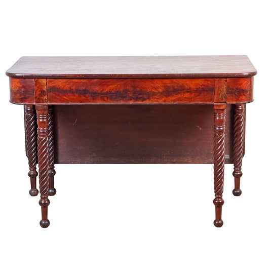 American Classical Mahogany Single Drop-Leaf Table with Spiral-Twist Legs, c. 1830–1845. This antique table features a rectangular top with curved front corners and elegant spiral-twist legs, embodying classic design and sturdy construction for a timeless vintage appeal. Brand: None/Unknown.