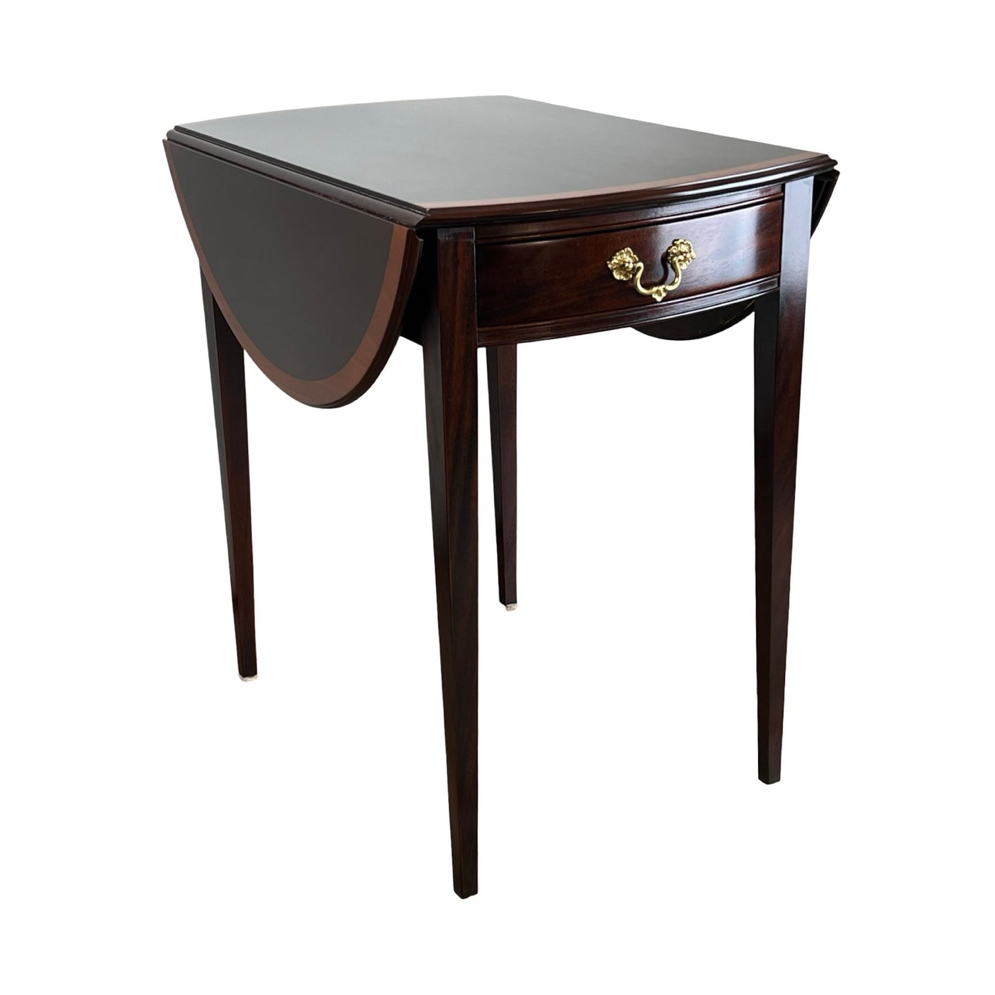 The Stickley Vintage Federal Style Edge Banded Mahogany End Table features slender legs, a single drawer with brass handle, and one leaf extended. Its classic design is perfect for elegant, traditional interiors.