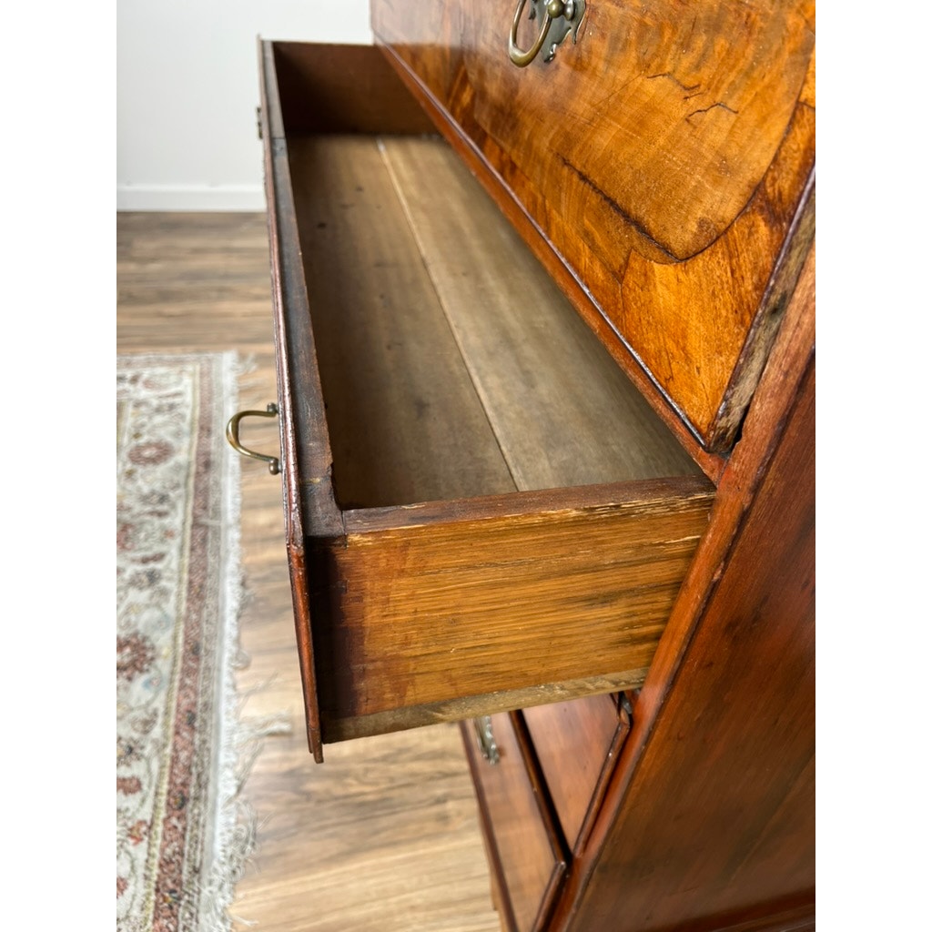 An open wooden drawer with brass handles reveals its empty interior in this Antique George IV Butlers Secretary (early 19th century), standing on a hardwood floor by a patterned rug and reflecting Regency English elegance. Brand: Unknown.