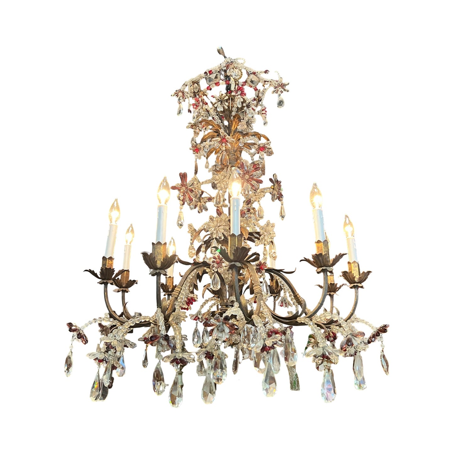 An Antique Late 19th Century French Rococo Tole chandelier, featuring ten lights, intricate gold metalwork, amethyst accents, crystal prisms, and hanging beads, is displayed on a white background. Brand: Unknown.