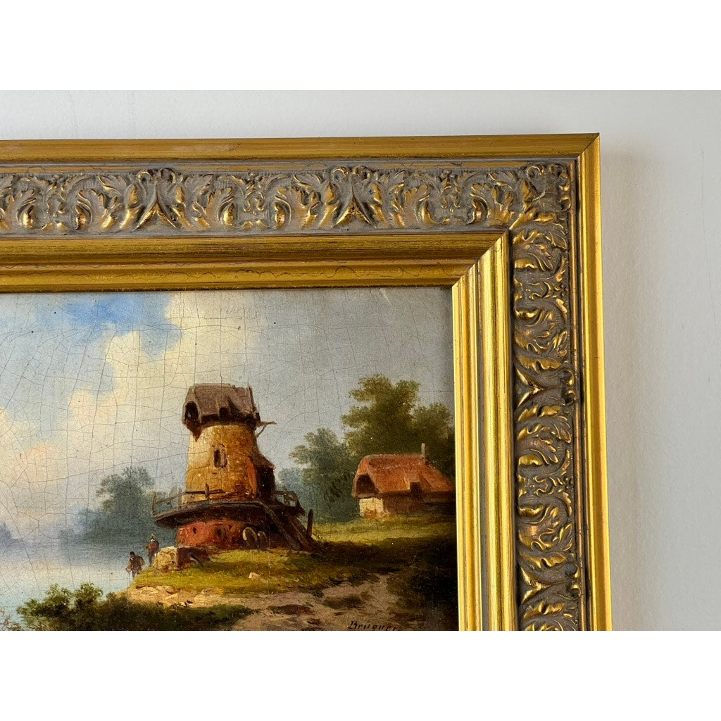 A close-up shows an ornate gold frame and part of the Antique Continental School Oil on Canvas Landscape with Windmill, signed “Brüguer,” circa 1880-1910, depicting two figures, trees, a small building, and a cloudy sky.