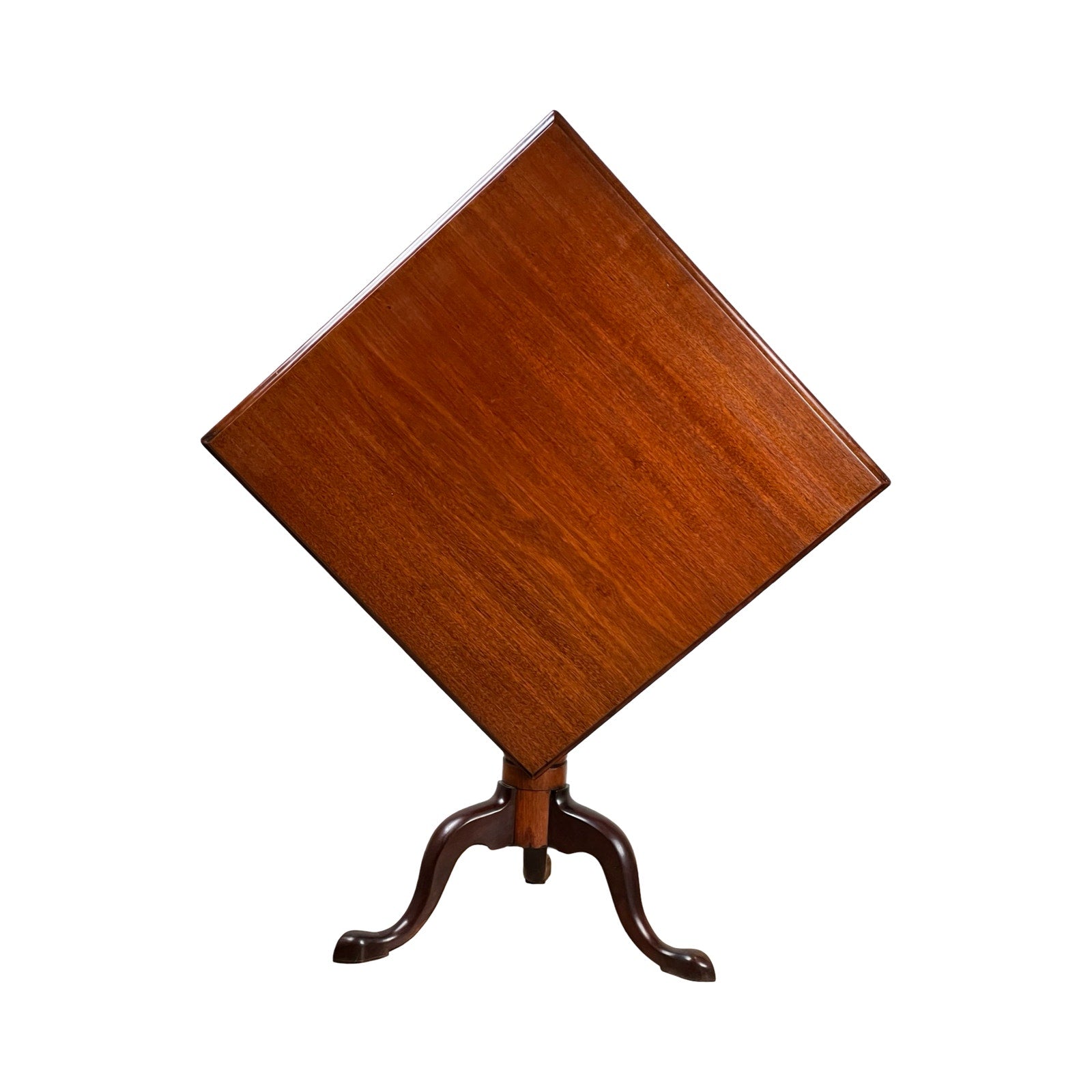 An Antique Queen Anne Mahogany Tilt Top Breakfast Table, c. Late 18th Century, with a polished square top set on a dark curved tripod base, is photographed against a white background.