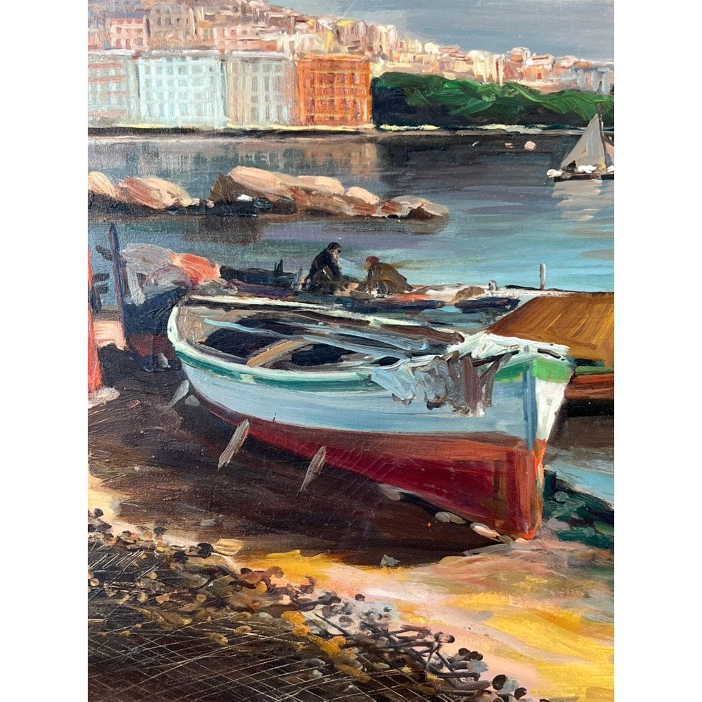 Painting Oil on Canvas “Naples Harbor” (28 x 52), signed lower left by C. Ciappa, features boats on shore with two people, water, a sailboat, rocks, green hills, and a vibrant cityscape under a sunny sky. Brand unknown.