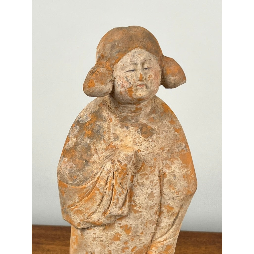 This Antique Chinese Tang Dynasty (618-907 AD) Terracotta Figure of a Standing Court Lady with COA depicts an elegant woman with rounded hair buns, robe, and garment in hand, capturing the refined artistry of early Chinese court figures.