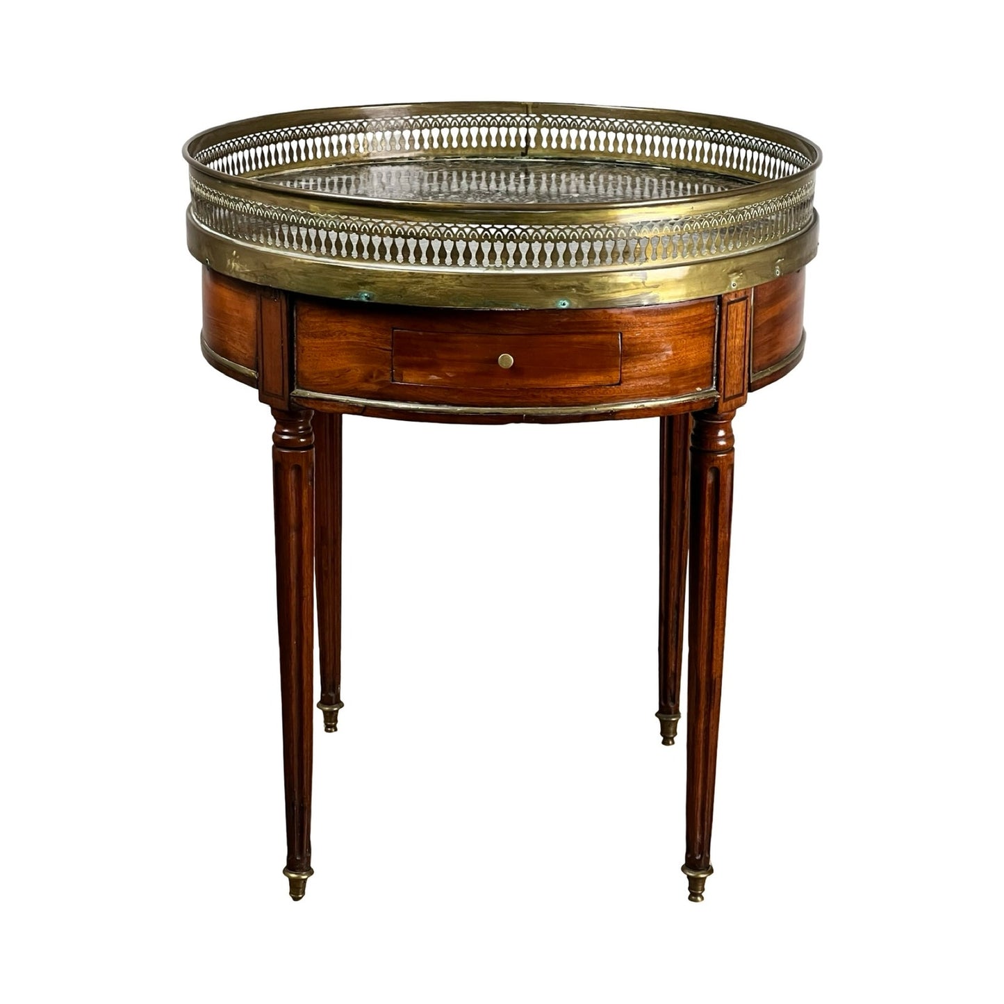An Antique 19th Century French Louis XVI-style mahogany bouillotte table with a marble top and pierced brass gallery brings timeless elegance to any room.