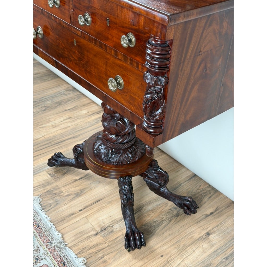 American Classical Carved Mahogany Dressing Table with Original Mirror, featuring carved wooden supports and three claw feet.