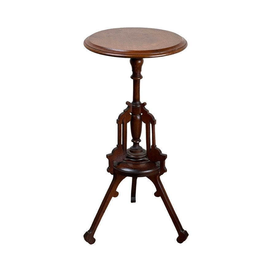 Antique Victorian Walnut Candle Stand, late 19th century, with a small round top, slender central column, and three curved legs featuring ornate details; shown against a plain white background.
