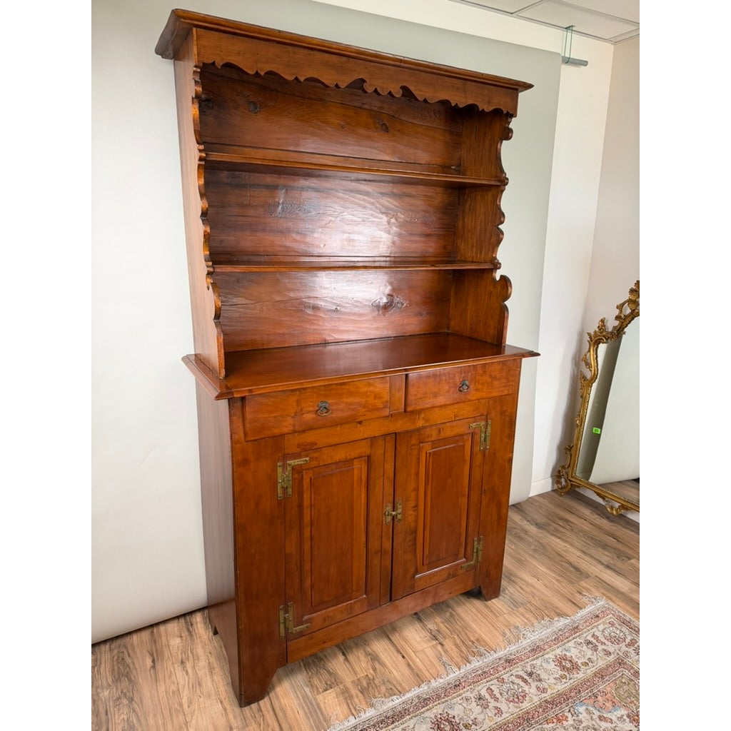 Pennsylvania or Mid-Atlantic Cherry Open Pewter Cupboard, circa 1800–1830, featuring two upper shelves and a base with two drawers above two cabinet doors.