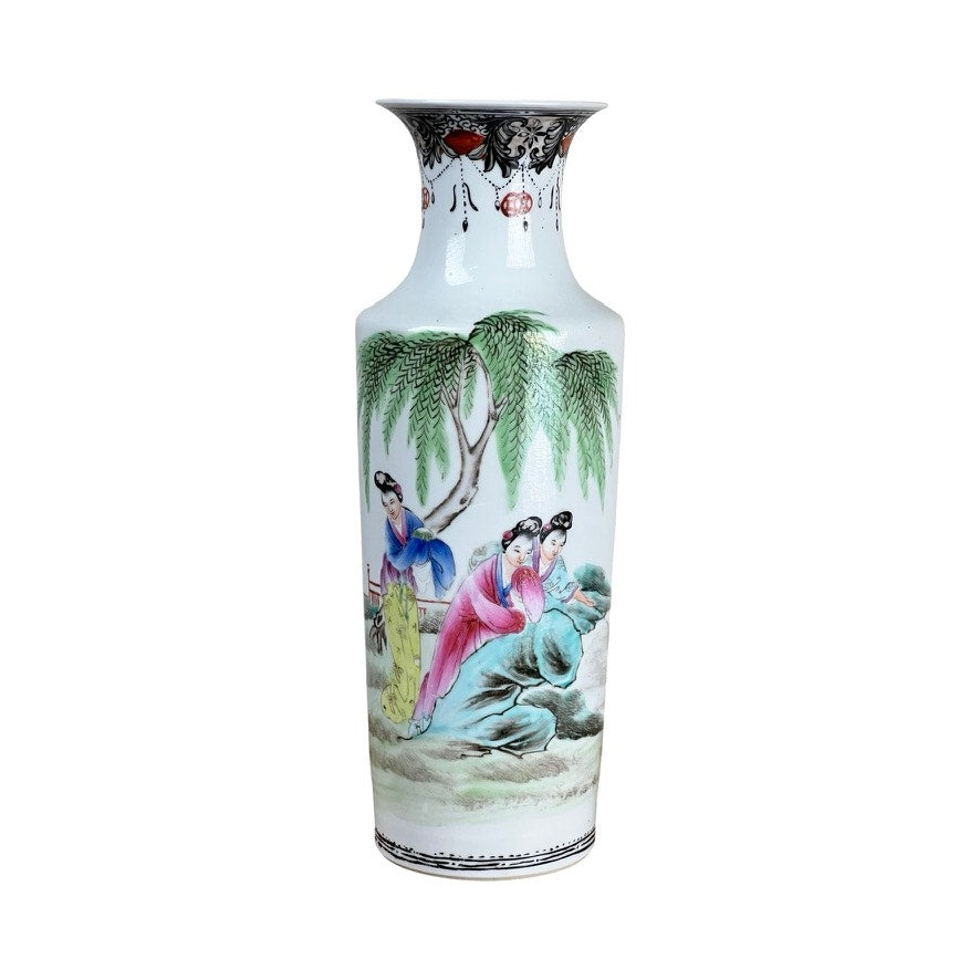 The Antique Qing Dynasty Famille Rose 12” Vase with Qianlong Mark features a tall white porcelain body, flared rim, and colorful figures in traditional dress amid a tree and rocky landscape. Brand: None/Unknown.