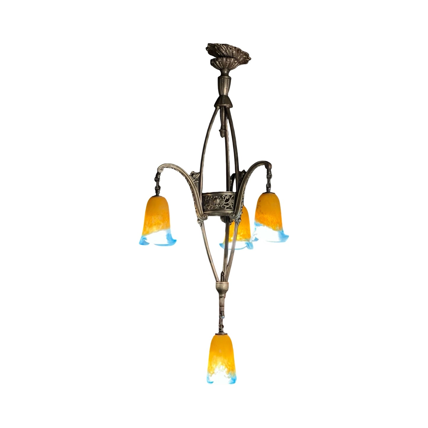 The Vintage Muller Frères Lunéville French Brass and Art Glass Four Light Chandelier by Muller Frères Lunéville features ornate brass arms and four yellow glass shades with blue edges, suspended from a decorative ceiling mount against a white background.
