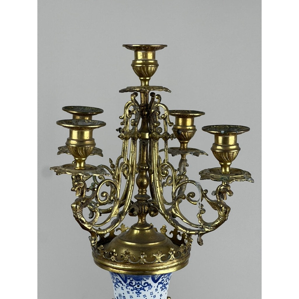 Five light gilt bronze scrolling arms on Dutch Delft porcelain candelabra